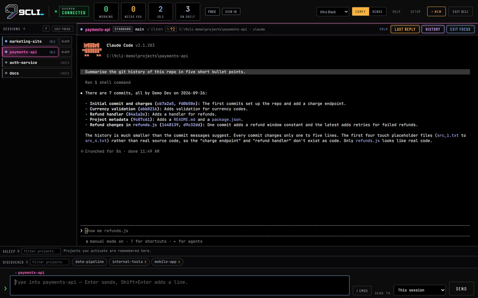 Focus mode in the Ultra Black theme. The payments-api session fills the stage with Claude Code's five-point summary of the repository's git history. The header shows the Standard profile, branch main, clean, and 2 commits not pushed. The rail on the left lists marketing-site and payments-api as Idle and auth-service and docs as Ended.